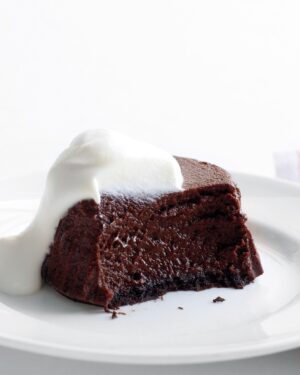Martha Stewart Instagram - Don't be fooled—these rich-looking desserts may look like a cheesecake had a baby with a molten chocolate cake, but they're much lower in fat thanks to the nonfat cottage cheese taking the place of cream cheese. Get the recipe for Martha's mini mocha cheesecakes at the link in our bio.