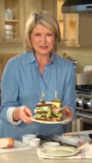 Martha Stewart Instagram - Martha’s club sandwich is the perfect way to make an ordinary lunch extra special. This two-tier showstopper features baked chicken topped with avocado, tomato, bacon, lettuce, and a sweet and sour gherkin. Three slices of toasted white bread slathered with mayo bring it all together. Head to the link in our bio to see more tasty sandwich ideas that will elevate your next summer gathering.