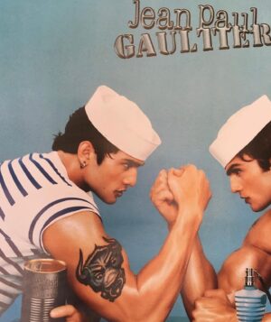 Maximilian Lee Piazza Instagram - swipe 👉 photo inspo: '90s Jean Paul Gaultier sailor ad  
 
Impromptu photo 📸 taken at my grandpa's after discovering his sailor hat from the time he served in the navy 🫡 🇺🇸 70 years ago  
 
 
 #navy #jeanpaulgaultier #couturefashion #fashion #vintagead