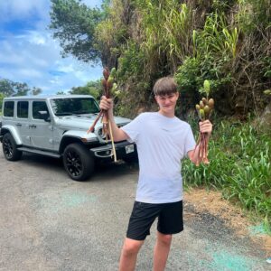 Michael Bisping Instagram - Successful day hiking through Maui jungles and the kids came back with a baby! Of course not but the joke was they were carrying the plant they collected like one. @elliebisping lucas we’re collecting Awapuhi which is a ginger plant that can be used as a natural shampoo. Ellie’s all about natural goodness and wrapped them up like that to take back to the hotel. Then a bit of cliff diving and a lovely dinner. First full day was one to remember. #maui