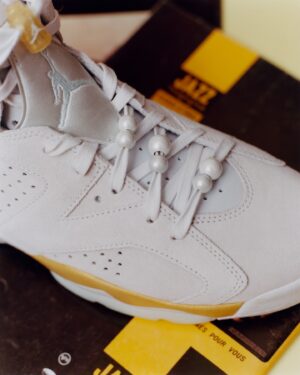 Michael Jordan Instagram - Move in grand fashion with the Air Jordan 6 ‘Pearl.’

With worn suede, gold details and pearl adornments, this premium women’s exclusive reflects the essence and beauty of Paris’ everyday scenes.

Link in bio to shop.