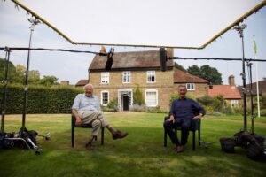 Michael Palin Instagram - Sir David and I recording our socially-distanced interview at a makeshift outdoor TV studio on one of the hottest days of the year. You can see my full interview with @DavidAttenborough in cinemas this week, as part of the world premiere of Sir David's new film, A Life On Our Planet. Visit www.attenborough.film to find your nearest cinema. Photo by @TheGavinThurston, courtesy of @WWF_UK and @Silverback_Films