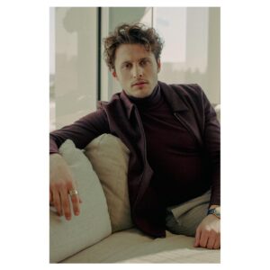 Michael Vlamis Instagram - In honor of the Black Friday Sale ending tomorrow, here’s a rare picture of me not wearing merch. Okay, maybe I’m wearing @vlambase socks. But that’s it!! Shop the new collection: michaelvlamis.com
