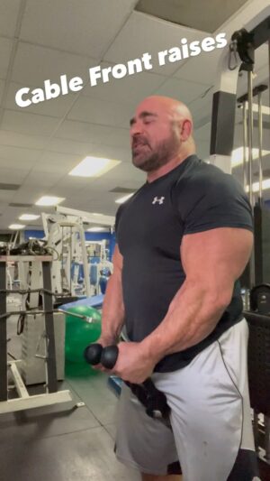 Mike Ergas Instagram - Cable Front raises 15 reps followed by 7 half reps to burn out. :)
