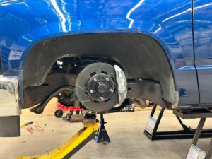 Mike Finnegan Instagram - Trying to stuff 275/35R20 @mickeythompsontires Street Comp rubber bands under the front of my 1998 GMC Sierra. Looks like they will go with some minor surgery.  Big enough to show off the @tbmbrakes but with enough sidewall that I won’t have to get my swerve on when I spy ATL potholes.