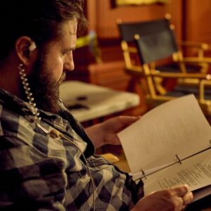 Mike Pecci Instagram - Checking the script on the set of WHOS THERE.
