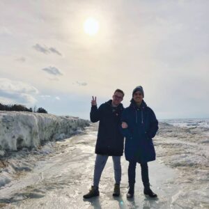 Mitchell Moffit Instagram - The nice thing about Canadian beaches in the winter is that you don't have to worry about your beach body! (Yes we are standing on a frozen solid waves with a snow dune beside us) ❄️🇨🇦🌊