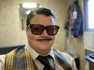 Murray Hill Instagram - Pallies! From the trailer at 8am (hence the shades)! I was incredibly fortunate to be a guest on @paulfeig & @bickspix new show "This Country" on @foxtv starring ⭐️ the talented and hilarious @_holmes_holmes @samstraley13 with @kaselig 🎬 Great working with kids half my age! A blast! Cast & crew top notch and full on showbiz! Out later in year 💥
.
.
#comedy #thiscountry #foxtv #showbiz #murrayhillman Glasses @fabulousfannysnyc Pomade @layriteofficial Shirt @vanheusenstyle Salmon jacket @talliaclothing