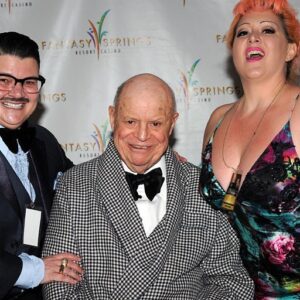 Murray Hill Instagram - Today’s photo memory is all 🪄SHOWBIZ ✨Here I am with the legendary @thedonrickles & @dirtymartininyc in Palm Springs 2016. We met Mr. Rickles after his show cuz my OG pal @albertmurcia74 hooked us up 🙏🏼 Of course, Rickles backstage look included velvet slippers and a custom robe. (Note: bow-tie still on). So grateful I saw him live so many times and met him before he passed. #showbizdreams #borsctbelt #catskills #hockeypuck #donrickles