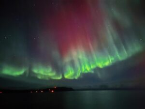 Natalia Cordova-Buckley Instagram - Under star flowers🌟🪷🌟

Floating on an autumn night over the sea just north of the Arctic Circle. 
The only noise comes from the gentle wind hitting the life rafts above our heads. 
In front of us, the miniature lights of a town called Honningsvåg. 
The vast ocean surrounds us, stretching away into the distance until it encounters the horizon. 
A barrier of darkness…the black sky polka doted by the stars.
Out of nowhere, without trumpets or sounds to announce its arrival, the bud of a giant flower. 
Slowly, color and light begin to manifest. 
A cosmic tulip blooming. 
A lotus flower blossoms. 
My mind knows that we are witnessing the Northern Lights but all I see is magic. 

The Cree Indians held that the Aurora was part of life’s circle and were the spirits of the dead who remained in the sky above their loved ones. The Cree believed that the lights were spirits of these departed friends and relatives trying to communicate with those they had left behind on earth.

Noche de Octubre 2-3.
Celebrando un año exacto de tu nueva vida. 
Gracias Primo! 

#auroraborealis