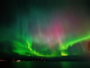 Natalia Cordova-Buckley Instagram - Under star flowers🌟🪷🌟

Floating on an autumn night over the sea just north of the Arctic Circle. 
The only noise comes from the gentle wind hitting the life rafts above our heads. 
In front of us, the miniature lights of a town called Honningsvåg. 
The vast ocean surrounds us, stretching away into the distance until it encounters the horizon. 
A barrier of darkness…the black sky polka doted by the stars.
Out of nowhere, without trumpets or sounds to announce its arrival, the bud of a giant flower. 
Slowly, color and light begin to manifest. 
A cosmic tulip blooming. 
A lotus flower blossoms. 
My mind knows that we are witnessing the Northern Lights but all I see is magic. 

The Cree Indians held that the Aurora was part of life’s circle and were the spirits of the dead who remained in the sky above their loved ones. The Cree believed that the lights were spirits of these departed friends and relatives trying to communicate with those they had left behind on earth.

Noche de Octubre 2-3.
Celebrando un año exacto de tu nueva vida. 
Gracias Primo! 

#auroraborealis