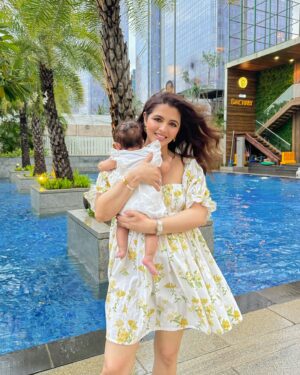 Natasha Luthra Instagram - Life lately 🥹🧿
1. Running back home after an event to take ziya for a walk 🏃‍♀️. Wearing the cutest dress from @arabellaaofficial 
2. Mumma & dada date night after so long ♥️
3. This @masilo.in carrier is the best thing ever. Nap times are so much 🥰🥰
4. Wore this stunning ivory outfit from Pakistani designer @saniamaskatiya 🤍
5. Some 📷 just before the @jjvalaya show . Fashion week with friends is always a good idea 👯‍♂️
6. Mid shoot shenanigans with @iris.filmss @nitinsaini_art @hairbysachinkhiwal 🤦‍♀️
7. Went for an event hosted by the lovely 
@kat_diaries 
8. 0.5 selfies for the win 🤳
9. Baraat ready 🌸
10. Clicked this pic as I loved the mirror and the Hollywood vibes🪞 
11. Holding my sleepy swaddled baby is the best thing ever 🥹