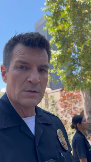 Nathan Fillion Instagram - I have learned that an excellent metric for how well a show is doing is the measure of shamelessness of looky loos and paparazzi when on location. #therookie #location #creepyaf