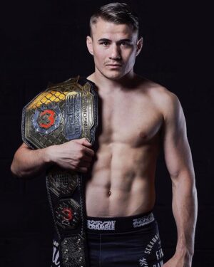 Nathaniel Wood Instagram - Never let someone tell you not to chase your dreams. 

16 years old with shorts too big, a brand new gum shield and the most suspect pose I’ve ever seen 😂 

I had a couple of people support me, other than that I was told to “be realistic” ,“get a job” “your living in a dream world” all by people close to me. I understand it was probably because they were scared I was wasting my time. 

I had about £40 a week to live on for around 8 years, three losses before I got signed but never gave up. 

Fast forward a few years and I won a world title, got signed by the UFC (dream complete), bought a property, traveled a vast amount of the world, paid for my wedding, purchased 2 of my dream cars, started 3 businesses and we’ve only just got started.

Moral of the story, don’t be “realistic” chase your dreams and give it everything you’ve got, life’s too short to just fit in. You will never regret chasing your dreams if it makes you happy. Enjoy and trust in that process ❤️ ✌️ 🙏🏻