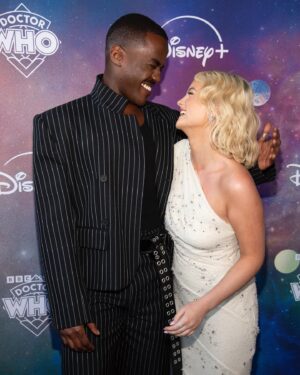 Ncuti Gatwa Instagram - We premiered Dr Who in LA last night and it was magical 🥹✨

N.G and M.G having adventures like The Doctor and Ruby 😍

I can’t believe that release day is finally here but I am so, SO ready for it to be unleashed into the world. 

Thank you so much @disneyplus @bbc @bad_wolf_tv for everything you have poured into the show. My wee @milliegibbo the titan @russelltdavies63 ….we bloody well did it 🙌🏾

Wearing @achillesiongabriel 
Styled by @felicitykay 
Grooming @nathanieldezan @iambarberizm 
📸 @nishajohny @jonathanjacobs_ @disneydoctorwho