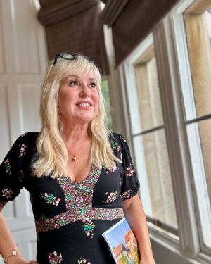 Nicki Chapman Instagram - Slight hot & slightly flustered. Not complaining ☀️

Bet it rains today as I’ve said that 🤦🏼‍♀️

Dress boden (old)
Necklace @annoushkajewellery 
Specs @izipizi