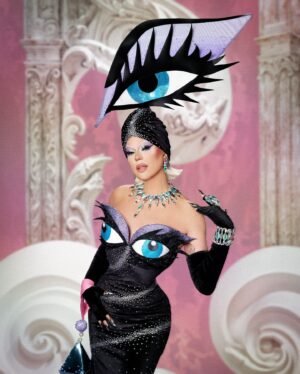 Nicky Doll Instagram - I am MASCara for your eyeeeeez 💄👁️

Honored to pay homage to one of my absolute Fashion Icon @bobmackie and finally make my own twist on one of my absolute favorite look. 
@cozzeppe @rochart_design and I had a BLAST designing all these looks this season. Fasten your seatbelt because we went hard! 

Shot by @ranobrac 
HMU by @juliencharlierparis 
Concept made with @cozzeppe 
Executed by @rochart_design 
Nails by @lapetitejesse 
Jewels by @gv.jewels_costumes