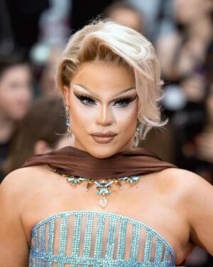 Nicky Doll Instagram - Yes we CANNES ✨

What an absolute pleasure to spend time in Cannes this year. Walking the red carpet with my two absolute icons, with whom we work relentlessly on this little show that does some real good in France and beyond 💅🏼 @daphneburki @kiddysmile we cleared. 

don’t forget to tune in for @dragrace_france season 3 May 31st! 🇫🇷💅🏼

Thank you @france.tv 🫶🏻

Wearing my icon @rochart_design sketched by @farida_kant 
HMU @juliencharlierparis 
Jewelry @gv.jewels_costumes 
Shoes @louboutinworld