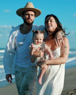 Nico Tortorella Instagram - We’ve got some big news: We’re having another baby!

This era has been all about transition, bending and shifting in order not to break. We left everything familiar to find something new—somewhere the grass really is greener because the sun shines more. We did it. We moved to a place where we can grow food year-round, where we can run barefoot, chase lizards, play in the ocean, and literally stop to smell the flowers. Somewhere we can continue to build our family.

The very day we arrived at our new house, we made a baby. Really, it’s true. It’s funny how, when you commit to dreams and embrace changes, miracles unfold.

Today’s a big day with a lot going on:

- My children’s book ‘Olivette is You’ launches today! @randomhousekids 
- I’m on the wonderful podcast @notskinnybutnotfat which is live right now!
- Also, my album ‘Born.’ drops this Friday, complete with a very special music video all about being pregnant.🔻🔺

Despite all this, seemingly none of that matters. Right now, this moment is a celebration of life at a time when life itself seems the most fragile.

Bethany, thank you for creating the space to continue to grow our family. We are nothing without you. I am constantly in awe of your strength and willingness to expand. And Kilmer Dove, get ready girl—it’s big sister energy from here on out. I love you both. I love all of you. All of it is you.

📷 by @rocco_tortorella