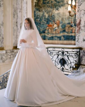 Olivia Culpo Instagram - @oliviaculpo and @christianmccaffrey are married! The model and former Miss Universe walked down the church aisle in Watch Hill, Rhode Island in a long-sleeve crepe crew neck ball gown with a voluminous skirt and button-lined back. “I wanted it to feel timeless, effortless, and as if it’s complimenting me, not overpowering me,” Culpo exclusively shares with Vogue. At the link in bio, watch her final fitting at @dolcegabbana and see the details behind her stunning gown. Photos: @josevilla