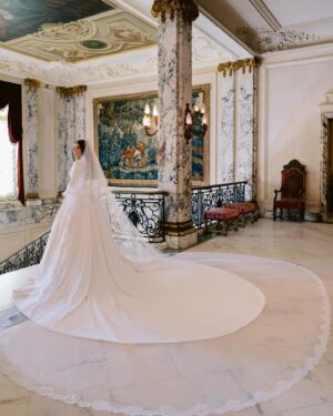 Olivia Culpo Instagram - @oliviaculpo and @christianmccaffrey are married! The model and former Miss Universe walked down the church aisle in Watch Hill, Rhode Island in a long-sleeve crepe crew neck ball gown with a voluminous skirt and button-lined back. “I wanted it to feel timeless, effortless, and as if it’s complimenting me, not overpowering me,” Culpo exclusively shares with Vogue. At the link in bio, watch her final fitting at @dolcegabbana and see the details behind her stunning gown. Photos: @josevilla