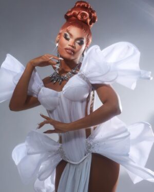 Olivia Lux Instagram - winter white 🤍🤍🤍

photo: @ericrichardmagnussen 
hair: @hatzbycarlos 
jewels: @draggedoutlondon 
corset: @sweetcarousel 
gown and ruffles: @blackandwhitestriped