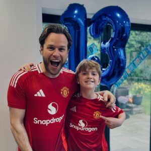 Olly Murs Instagram - Forever in his United shirt and Forever a Red! Uncle loves ya Louie Happy 13th Birthday! Time flies! Thanks @manchesterunited New shirt is class 😮‍💨👌🏻🔥