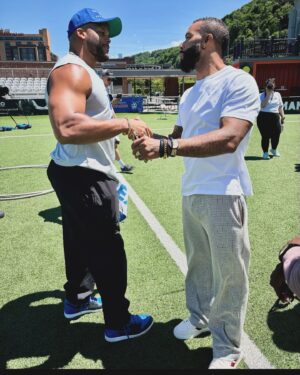 Omari Hardwick Instagram - Good day…good people. This post has been a hard one to share….as it triggers a heavy heart in me (pun unintended). A little over 2 weeks ago, i joined my giant of a lil bro #DamarHamlin for his #ChasingMsFoundation charity bball game & to loan my time, spirit, words to another Pitt native & soon to be NFL hall of famer, @aarondonald99 & the youth of his football camp, along with the Pittsburgh community at large. 
🖤💛
Hours after Damar’s charity game….i got the “heartbreaking” news that one of my longest standing bros had passed of a heart attack in our hometown of Atlanta, WHILE i was on the court with a now legend & living/breathing poster child of God’s Miraculous Power & Mercy…who as we ALL know….SURVIVED a heart attack; from which DH3 was brought BACK to LIFE. I am sharing this post now with that deep gratitude. 
🙇🏾⭐️
Thank you to The Hamlin Family, to The Donald Family, to the @chasingms_foundation … to all the Sponsors, to the Security teams, to The Pittsburgh community, & to ALL the fans…especially the young ones! Most importantly, i thank Almighty God for my brother @binfordcarter & the life he 
lived❗️I thank God Almighty for my brother @d.ham3 & the life he is #LIVING❗️❣️ …. 🙏🏾3️⃣🫶🏾