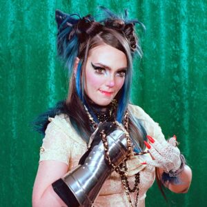Parker Day Instagram - She’s a renaissance cat, I think? Idk but it’s a vibe. 
Who else went to the ren faire this year?

Model: Hannah @borg.deco 
Mood: Confident
Sign: Capricorn
Prop: Gauntlet
Background: Green 

Crew: @screaminmeemz @ariasburdelli