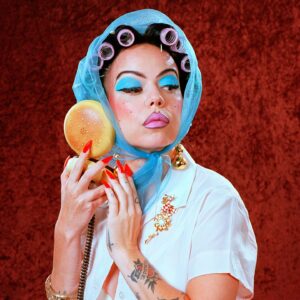 Parker Day Instagram - I just love a classic sleazy diner waitress look 🍔

Model: Olivia @shmelvispresley 
Mood: Suspicious 
Sign: Virgo
Prop: Burger
Background: Brown