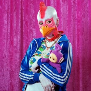 Parker Day Instagram - Chickenhead 🐔

Model: Jenna @viscera.tattoo 
Mood: Embarrassed
Sign: Cancer
Prop: Teletubby
Background: Purple

Crew: @screaminmeemz @ariasburdelli
