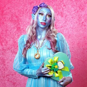Parker Day Instagram - Ren faire romantic 💝 

Model: Una @uperson 
Mood: Infatuated 
Sign: Aquarius 
Prop: Chocolates 
Background: Bubblegum

Crew: @becomingeden @ariasburdelli