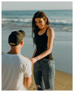 Paul Tellefsen Instagram - SHE SAID YES! 
Meet my fiancé, @nicatellefsen.
.
This past weekend I escaped the snowstorms and surprised Veronica on the beach where we had our first date and asked her if she wanted to marry me! She said YES! Very quickly if I might say so!! We’re elated!! Choosing her is easy. I credit God for bringing us together and keeping us together. I mean He literally dropped Nica into my life at a baby shower! Insane.
.
Veronica, you are the picture of God’s beauty and wonder on the earth. The way you encourage my leadership has made me a better man. God is faithful. Today I choose to be your fiancé. And I can’t wait to one day choose to be your husband ... for a lifetime. 
I love you.
#thisispaulsstory