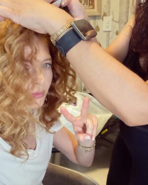 Rachelle Lefevre Instagram - Pic 1: Taking myself very seriously during on set hair touch-ups
Pic 2: That’s not really a peace sign, it stands for “two hours” which is how long even five minutes feels when I have to sit still 🤪