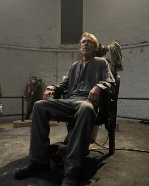 Richard Brake Instagram - Chilling out in my chair on the set of The Gates. Just happens to be an Electric Chair. The Gates is out in the US on @appletv. Out in the U.K. July 3. #thegatesfilm #101films @stephenhallfilm