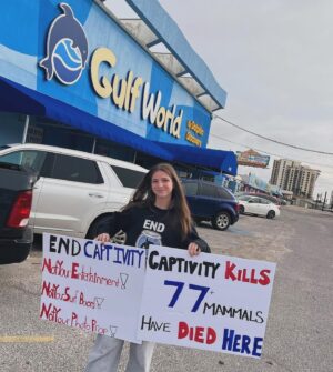 Richard O'Barry Instagram - A 13 year old girl named Hope stands alone in front of a dolphin Abusement park in Panama City, Florida. She is hoping to influence a potential customer into changing their mind about buying a ticket. Hope is a champion, she represents great hope for the future. Hope shows up. She speaks out against the madness. She’s the real deal.  Little miss Hope gives me more hope than the entire animal welfare industry combined. We support Hope. We support real animal rights activists and grassroots organizations. (Note to her parents: you are probably awesome too!)
#dolphinproject #umahlumba #saynotothedolphinshow