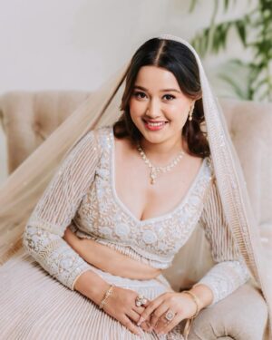 Riyasha Dahal Instagram - Elegance in a snap. 🤍 
.
.
.
.
Wearing: @samrat_couture @samratraiofficial 
MUA: @swechchhya.makeup 
Hairstylist: @glamby_pratikshya 
Assist by: @rajshbibhari_ 
Jewelry: @shree_natraj_jewellers 
Lens: @visions.np