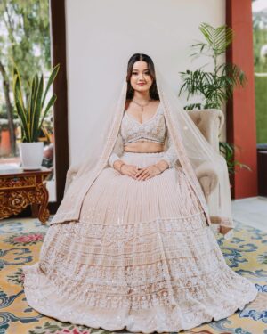 Riyasha Dahal Instagram - Elegance in a snap. 🤍 
.
.
.
.
Wearing: @samrat_couture @samratraiofficial 
MUA: @swechchhya.makeup 
Hairstylist: @glamby_pratikshya 
Assist by: @rajshbibhari_ 
Jewelry: @shree_natraj_jewellers 
Lens: @visions.np