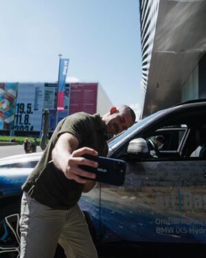 Russell Tovey Instagram - Artist Es Devlin shares with TalkArt about SURFACING, Devlin’s new work commissioned by @BMW for Art Basel in Basel 2024.

During this year’s internationally loved art fair, @EsDevlin brought @RussellTovey and @RobertDiament of @TalkArt on a personal tour of SURFACING. Collaborating with Paris-based choreographer Sharon Eyal, Devlin created a box of water that transformed into a magician’s conjuring apparatus, surfacing dancers through layers of water, light, paint, and pixels.

Paired with a pilot fleet of BMW iX5 Hydrogen vehicles enveloped in prints of Devlin’s collaged paintings and transformed into mobile sound installations with artist and engineer conversations, Devlin’s work at @ArtBasel illuminated themes of hydrogen, technology, ritual and transcendence.

Swipe to see behind-the-scenes from TalkArt’s interview with Devlin and BMW Hydrogen engineer Jürgen Guldner and tune in at the [link in bio] to learn more.

📸: @josselin