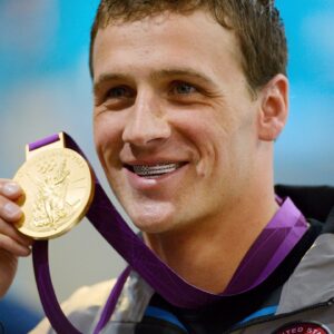 Ryan Lochte Instagram - #throwback 12 yrs ago we made history with the 1st ever #Olympic Grillz 🇺🇸💪 Custom American Flag Diamond & Ruby hand-prong set #GrillzByJohnnyDang for 12x Olympic medalist @ryanlochte 🏆 #DiamondBoyz 

Tag the champs on @teamusa that you want to see with a Grillz next!!👇🏻 @nbcolympics 
.
.
.
.
.
#grillz #customjewelry #olympics #johnnydang #kingofbling #ryanlochte #teamusa #swimming #explore