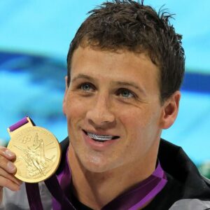 Ryan Lochte Instagram - #throwback 12 yrs ago we made history with the 1st ever #Olympic Grillz 🇺🇸💪 Custom American Flag Diamond & Ruby hand-prong set #GrillzByJohnnyDang for 12x Olympic medalist @ryanlochte 🏆 #DiamondBoyz 

Tag the champs on @teamusa that you want to see with a Grillz next!!👇🏻 @nbcolympics 
.
.
.
.
.
#grillz #customjewelry #olympics #johnnydang #kingofbling #ryanlochte #teamusa #swimming #explore