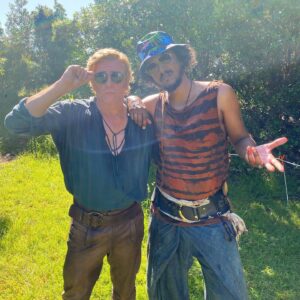 Samba Schutte Instagram - Crew Shoutout part 2: the first time I met @rhysiedarby at rehearsals he said hi and I said “I LOVE YOU”☠️ Never walked it back since. He worked so hard this season but always looked cool, always improvised effortlessly as Stede⚔️ That red suit WAS cursed- triggered the fire alarm as soon as he stepped on stage❤️‍🔥 And that mermaid tail was really heavy, but look how graceful!🏴‍☠️🧜‍♂️ 
#OurFlagMeansDeath #ofmd #ofmdseason2 #bts