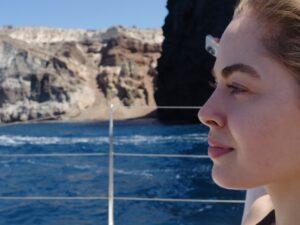 Sarah Dugdale Instagram - Greece 
1- Most content on or near the water. 
2- A man I’m quite fond of.
3- Happy. 
4- Heraklion Archeological Museum. 
5- Agia Pelagia, Crete. 
6- A meal in the mountains at Ntounias farm. 
7- Windy Mykonos. 
8- Me in the sea. 
9- A beach. 
10- A Santorini sunset.