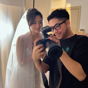 Sarah Lian Instagram - Couldn’t be more in love with this wedding gown by @syomsz @syomirizwagupta. Featuring an asymmetrical neckline with illusion panels and a corseted bodice, this dress had a silk chiffon skirt that was incredibly light, with a sexy high slit for ventilation. 

It had all the details I wanted without looking over the top and yet a traditional white with beautiful floral motif lace overlayed to create depth with textures. With hand sewn appliqués on both my veil and dress (by Martin and Syomzs), this was 100% made with love. 

Most of my meetings with Syomir was 1:1 and there’s no one else I would have wanted to create this special piece that will be etched forever in my memory. Syomir, I love you and I’ve never felt more Yan Sow Lin in my life! Thank you for creating this with me. ❤️❤️❤️

Pino- we finally made it happen!!! Kakak dah kahwin! 

📷: @pinography 

#syomirizwa #weddinggown #thetingtengs #bespokedesign