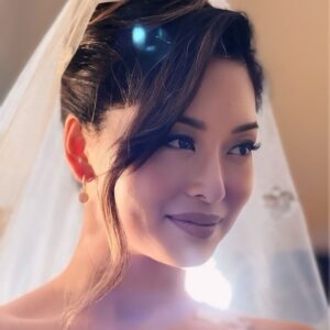 Sarah Lian Instagram - Couldn’t be more in love with this wedding gown by @syomsz @syomirizwagupta. Featuring an asymmetrical neckline with illusion panels and a corseted bodice, this dress had a silk chiffon skirt that was incredibly light, with a sexy high slit for ventilation. 

It had all the details I wanted without looking over the top and yet a traditional white with beautiful floral motif lace overlayed to create depth with textures. With hand sewn appliqués on both my veil and dress (by Martin and Syomzs), this was 100% made with love. 

Most of my meetings with Syomir was 1:1 and there’s no one else I would have wanted to create this special piece that will be etched forever in my memory. Syomir, I love you and I’ve never felt more Yan Sow Lin in my life! Thank you for creating this with me. ❤️❤️❤️

Pino- we finally made it happen!!! Kakak dah kahwin! 

📷: @pinography 

#syomirizwa #weddinggown #thetingtengs #bespokedesign