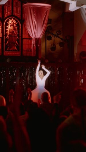 Sasha Velour Instagram - The PROUDEST performance of my life 🔔💔🤍💎(watch to the end for a reveal that takes my breath away every time). 

Thank you @kesha for writing this amazing song “Praying” from such a personal and powerful place. It continues to take on new meaning and resonance! 🌈

Based on the “magic” costume reveals of medieval church theater (which in turn were inspired by ancient queer spiritual shows) I wanted to use my dress as a tool for storytelling. The red dress represents the judgement placed on so many people by hate (and often religion), and as it lifts it reveals the purity and truth that exists behind the lies. If we can just be seen as we truly are, we can refract new possibilities for light, love, and joy all around us. 

Watch @WereHere Season 4 on @HBO/@streamonmax. So grateful to the huge team who made this possible. 

Concept and direction by me (with support from @zoeziegfeld and Johnny Velour)
Dress: @diegomontoyastudio @marcosquared (inspired by @balenciaga)
Earrings: @schiaparelli 
Video: @cosettepindesign