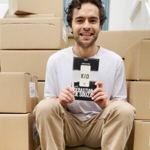 Sebastian de Souza Instagram - Dear Souzles, the fact that this is my 1000th post on Instagram is totally coincidental but, in the circumstances, it feels pretty appropriate!

The first picture in this very happy carousel is of me sitting on some steps, holding my first ever book, surrounded by boxes and boxes more of them. (These are the books that you pre-ordered on the @offlineruniverse site! All of which will now be signed, whether you like it or not, and sent directly to you!) 

The third video is of the books actually arriving, driven here from the printers by the unbelievably kind and generous spirited Darren (who definitely thinks I am more than just a bit crazy, having four hundred 600-page paperbacks delivered “curbside”). 

The fifth picture is of Darren and I and the book. We opened one of the boxes, pulled out the first ever copy of KID: A HISTORY OF THE FUTURE in the world and Darren took it home! The first ever Offliner! 

So to Darren, the Souzles and ALL the Offliners out there in the @offlineruniverse — thank you for making my dreams come true. 

I wrote this book for you. 

Lv U All Forever, SdS
