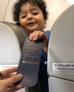 Shashank Arora Instagram - The cutest munchkin watches over me during today's turbulence. He insists I try the veg meal option because, "gurgle gurgle ba boo." (Veg is the way to go)
Thank you for the advice little one, but I'm sorry, I love my murg. Your little shake of the head in the end tells me you don't approve. It doesn't matter however, because you so cute it blows my mind. 
PS: Maybe flying with little kids isn't that hard if you aren't an arsehole.