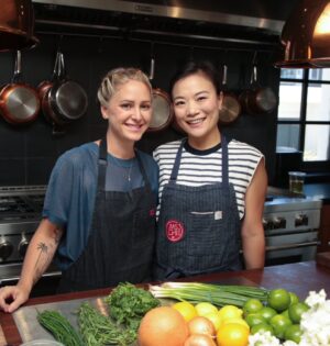 Shirley Chung Instagram - 🔥🔥🔥 Are You ready for our Rematch?! @chefbrookew 🐽🐷🫘 📺This Tuesday July 16th 9pm on @foodnetwork , I will be taking on the Titans!  will be cooking against friends, Tiffany and Michael, for the very first time ❤️ but I am most looking forward to compete against my good friend, old roomie, my bunk bed mate Brookie for the first time since our Top Chef finale 8years ago! 👊  Look, we even have the same pose standing in front of our judge @geoffreyzakarian.  Can you guess what we will be cooking in our rematch? 😉  Hint, we def have a little history on the ingredients 🤔. Premiering Tuesday, July 16th at 9pm – “Titans vs Shirley Chung”
Chef Shirley Chung has a bone to pick with Bobby Flay’s Titans — especially her former roommate, Brooke Williamson. While Shirley’s intimate knowledge of the Titans could lead to their downfall, Iron Chef Geoffrey Zakarian’s judging keeps everyone on their toes.
 
#BobbysTripleThreat @foodnetwork @StreamOnMax #chefshirleychung #dumplingmafiaqueen