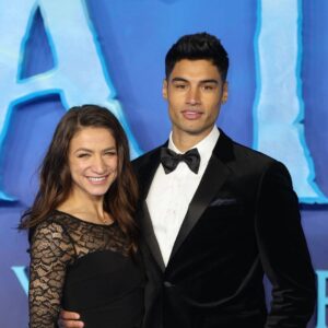 Siva Kaneswaran Instagram - We went to see @avatar 2 last night! It was sooo good. Honestly, Pandora was as beautiful as ever. Make sure to go see it! Also, It was lovely to take a break off ice with @klabera.ko and bring her to her first ever premiere! 🙏🏾👏🏾 (slide 3 is her geeking out to Kate winslet)

Suit @reiss 
Styled by @sheppardstyle